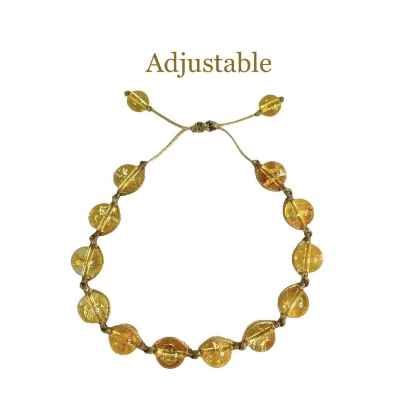 An adjustable Citrine String Bracelet with a yellow bead.
