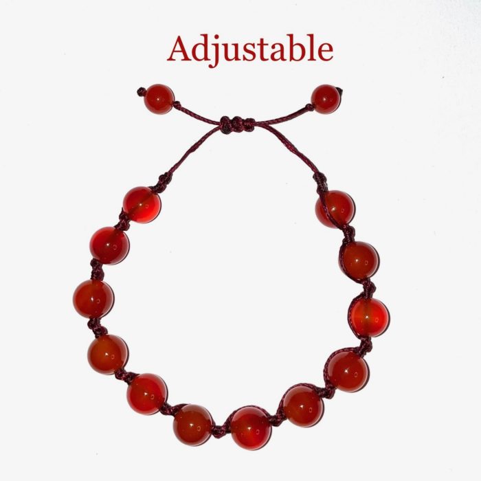 An adjustable red Carnelian Crystal String Bracelet.