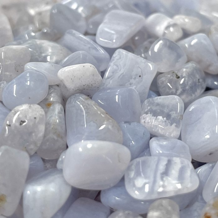 A close up of a pile of Blue Lace Agate Crystal Chips AA Grade.