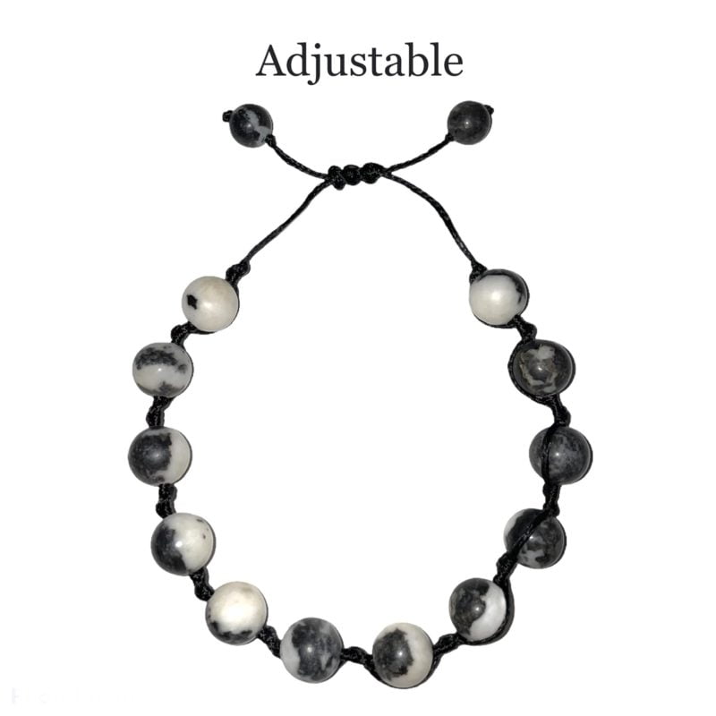 A Dalmatian Jasper String Bracelet with adjustable black and white beads.