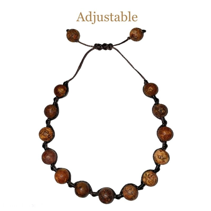 A Bodhi Beads String Bracelet with adjustable brown beads.