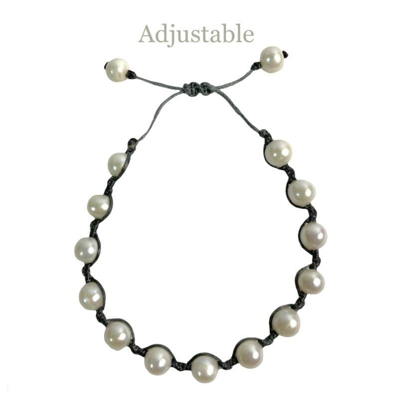 A Freshwater Pearl String Bracelet with a black cord.