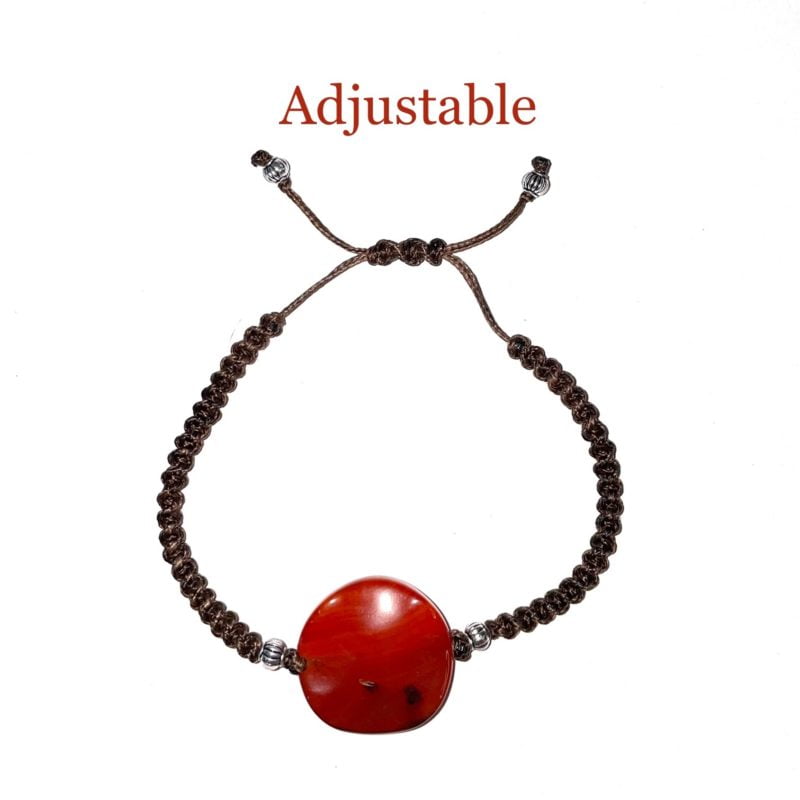 An adjustable Red Jasper String Bracelet with a red jasper stone on it.