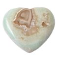 A Caribbean Calcite Heart shaped piece of agate.