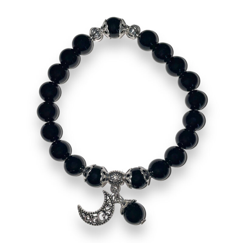 A black onyx bracelet with a moon charm.