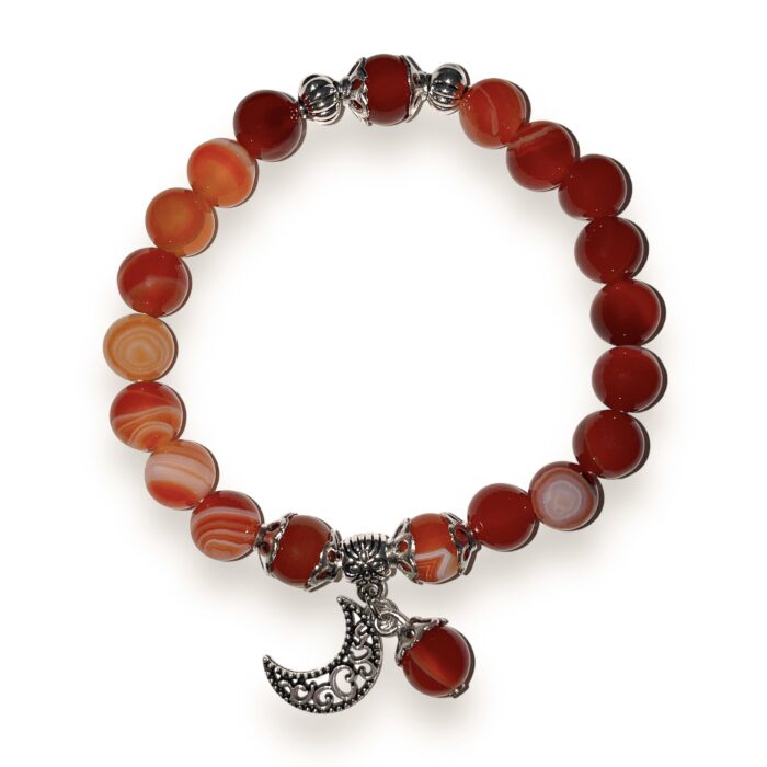 A red agate bracelet with a crescent charm.